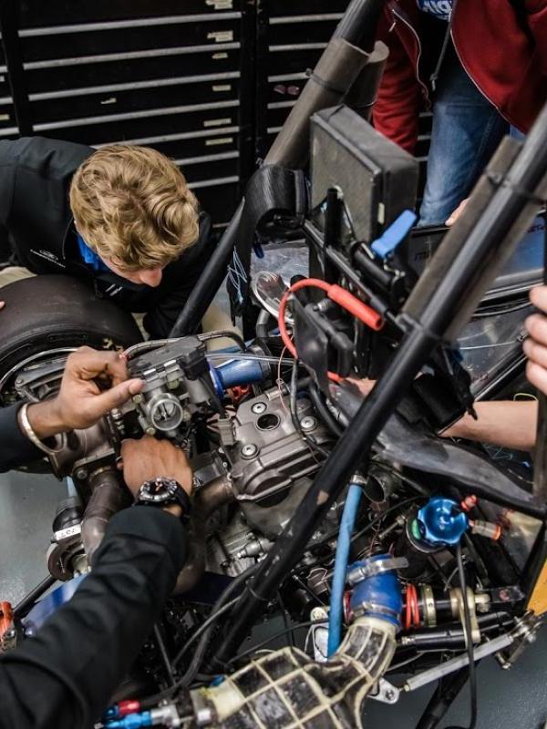 Students working in the SAE garage